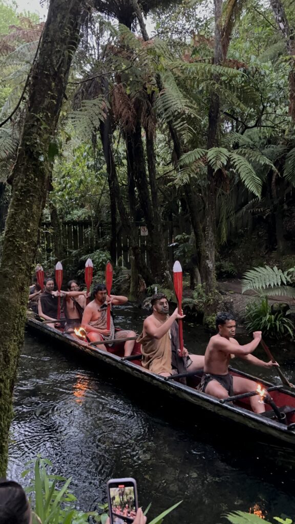 Maori men in a boat
