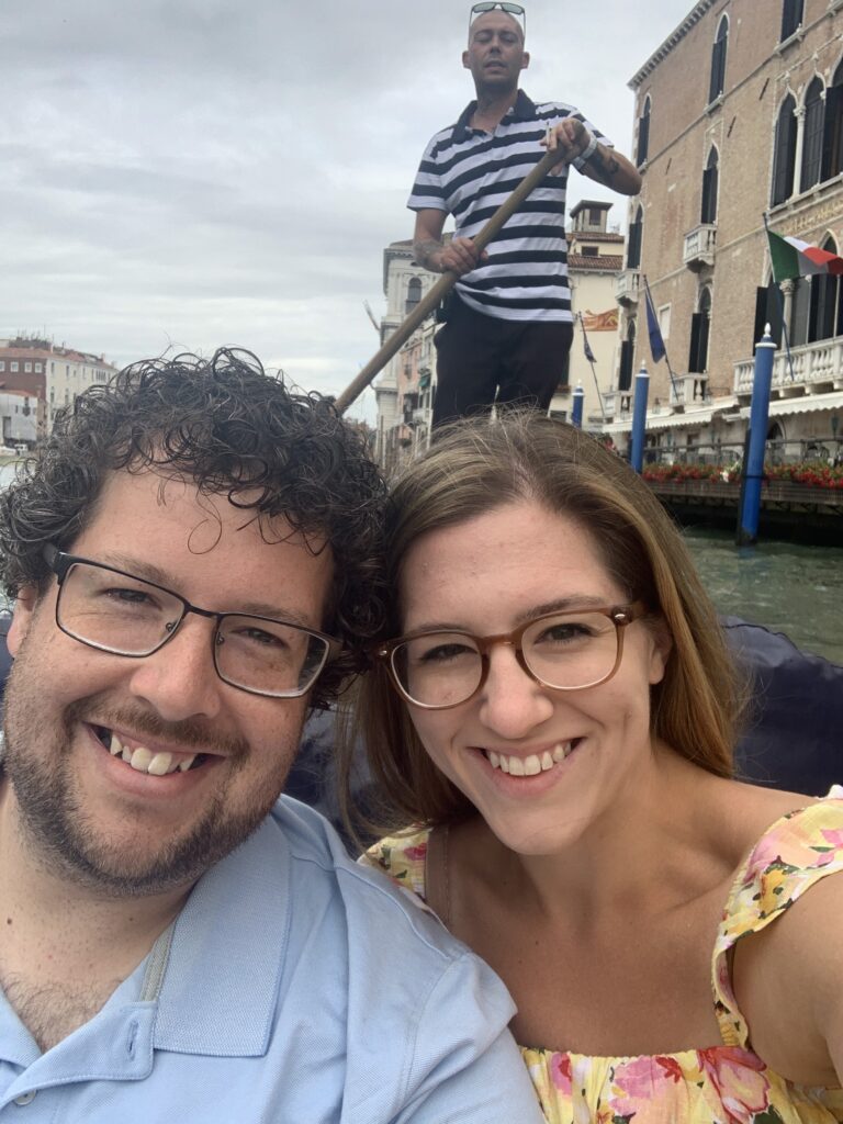 a couple taking a selfie in a gondola