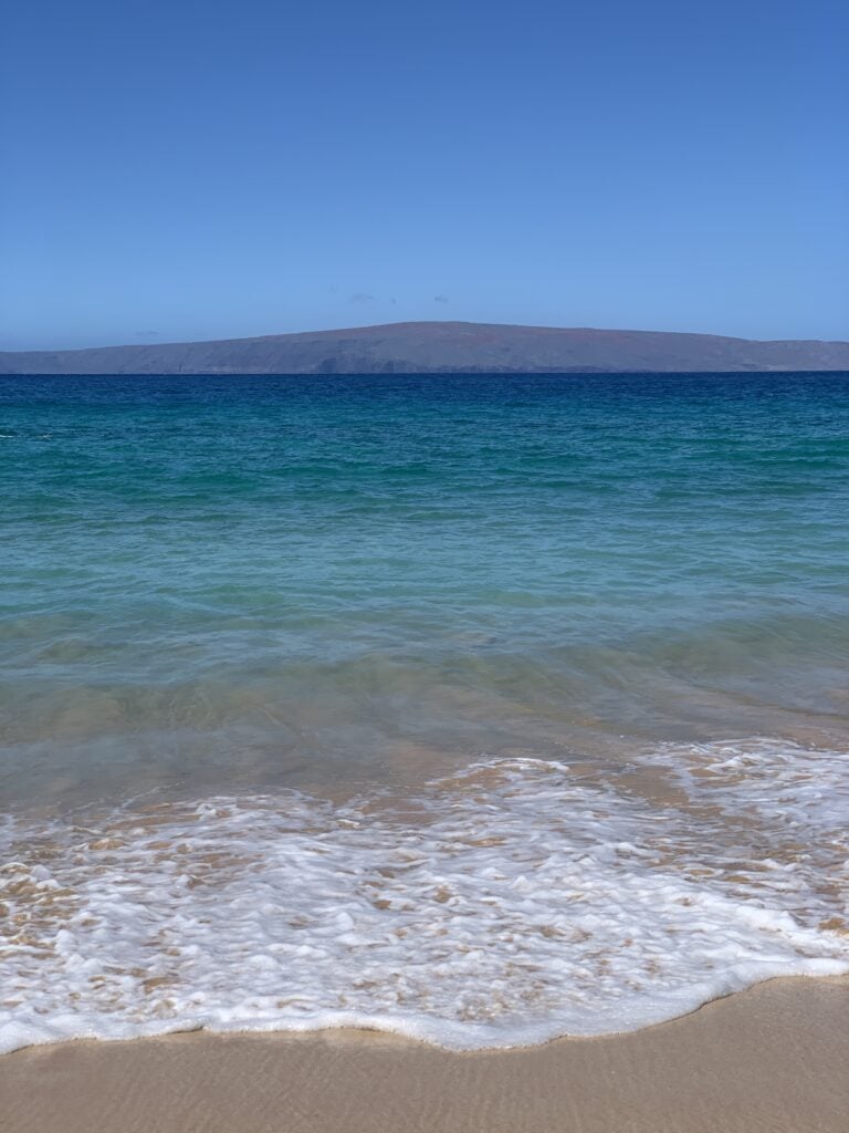 the ocean with clear blue water