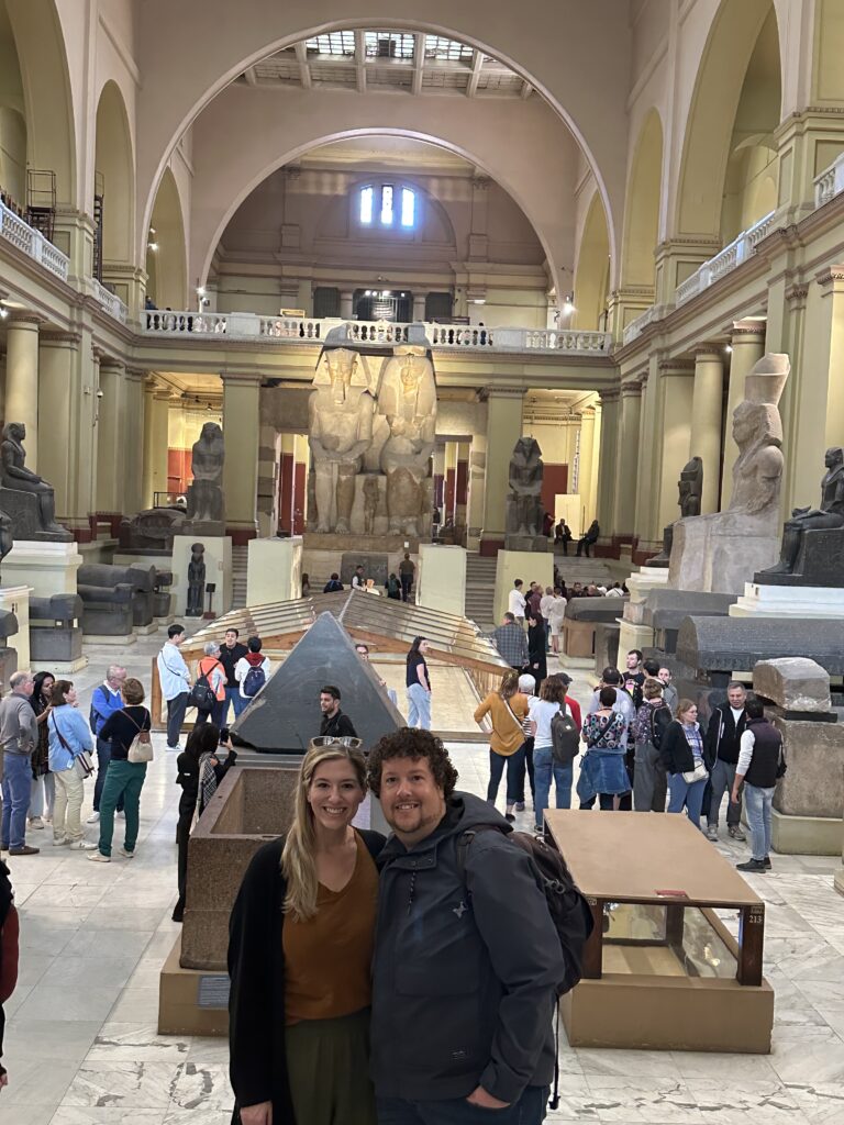 a couple standing in the Egyptian Museum